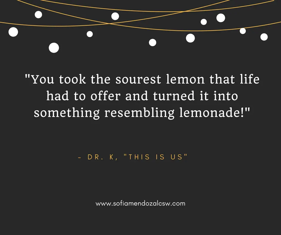Dark background with white string lights and a quote about turning difficult situations into something positive